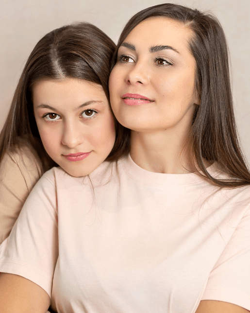 teen girl and mom hug finding out the benefits of dbt therapy
