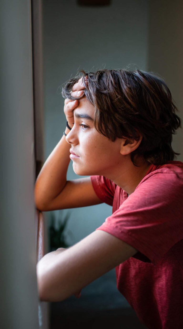 Young boy showing sign of depression