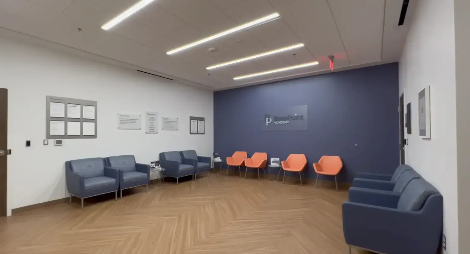 basepoint-academy-arlington-sign-blue-wall-angle