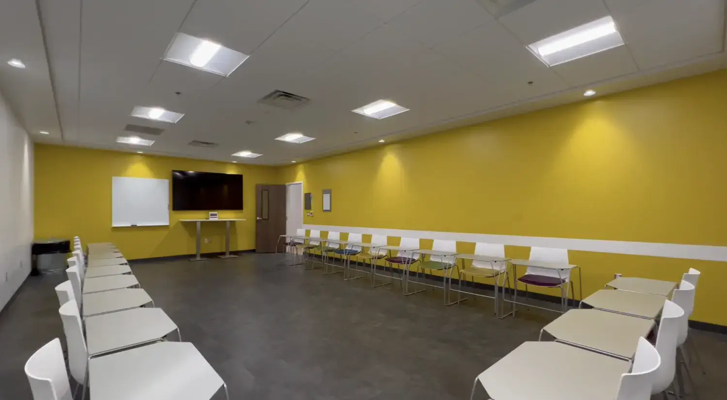 basepoint-academy-arlington-yellow-therapy-room-tv