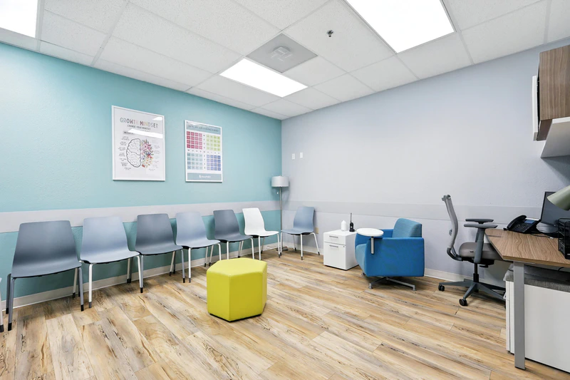 basepoint-academy-forney-teen-mental-health-facility-small-group-room-blue-with-desk