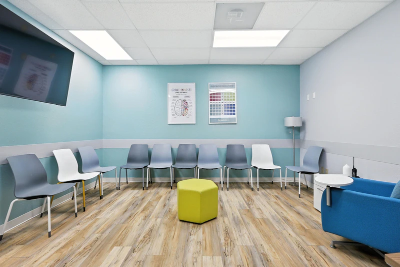 basepoint-academy-forney-teen-mental-health-facility-small-group-room-blue-with-tv