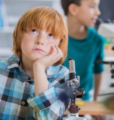 An adolescent boy has trouble concentrating in class