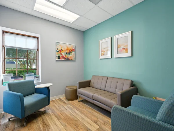 basepoint-academy-forney-teen-mental-health-facility-consultation-room-wall-with-paintings