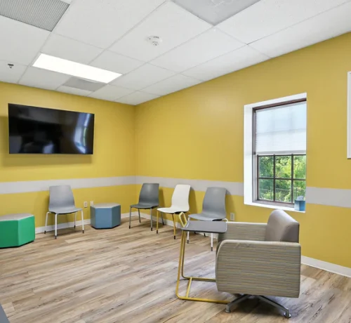 basepoint-academy-forney-teen-mental-health-facility-small-group-room-yellow-with-tv basepoint-academy-forney-teen-mental-health-facility-small-group-room-yellow-with-tv