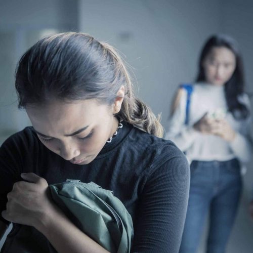 Teen girl being bullied at school