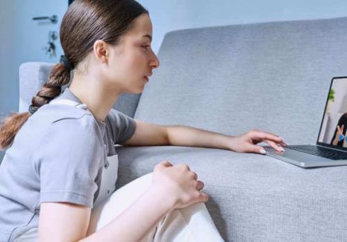 Teen girl talking to an online therapist