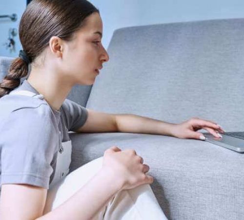 Teen girl talking to an online therapist