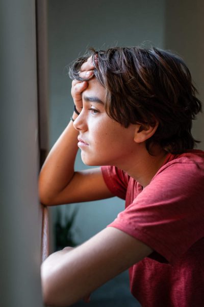 Young boy showing sign of depression